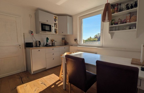 Carpin Wohnung | Ferienwohnung im gemütlichen Bauernhaus am Badesee mit großem Garten und Sauna