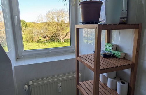 Carpin Wohnung | Ferienwohnung im gemütlichen Bauernhaus am Badesee mit großem Garten und Sauna