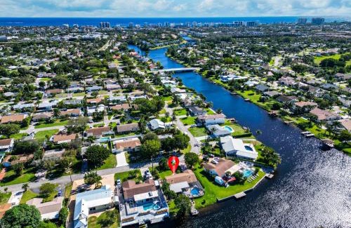 Tropic Palms Haus | VacationSunwind Delray home! Water Front Pool Dock near Beach