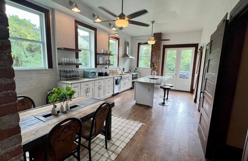 Five Points South Haus | Vulcan's Knee: 6bdrm Mansion ~ Speakeasy ~ Library