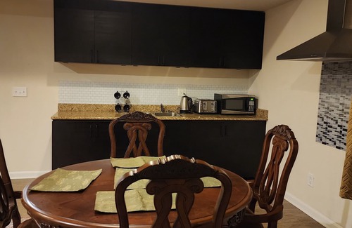 Triangle Haus | Walk in sunny furnished basement with 2 bedrooms and 2 bathrooms