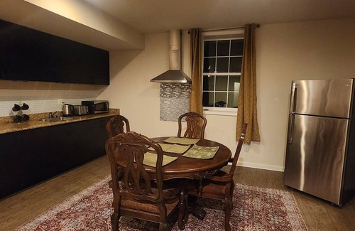 Triangle Haus | Walk in sunny furnished basement with 2 bedrooms and 2 bathrooms