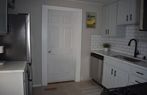 Michigan City Haus | Walk to the beach from this charming 2 bed/1 bath home in historic Michigan City