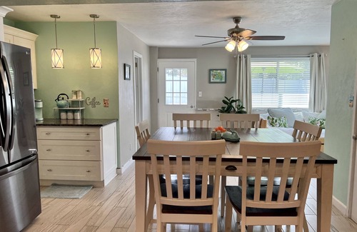Sunny Shores Haus | Walk to the beach! Spacious home with comfy beds, game room, & fenced yard.
