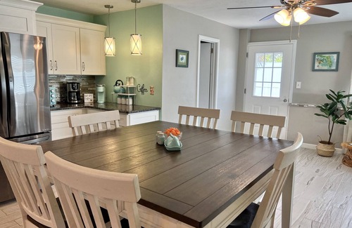 Sunny Shores Haus | Walk to the beach! Spacious home with comfy beds, game room, & fenced yard.