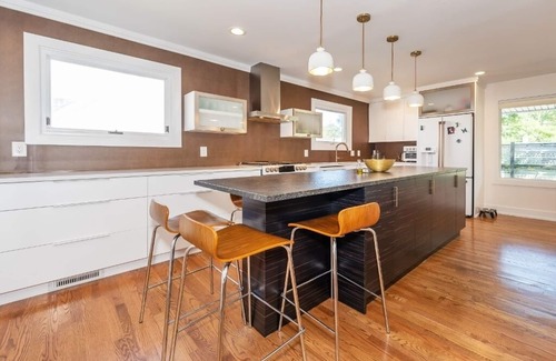 Ann Arbor Haus | Stylish remodeled home one mile from U of M football stadium with Tesla Charger