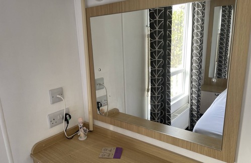 Hamworthy Haus | Water Lily lovely dog friendly caravan on Rockley Park, Poole Harbour + Sea View