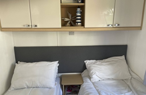 Hamworthy Haus | Water Lily lovely dog friendly caravan on Rockley Park, Poole Harbour + Sea View