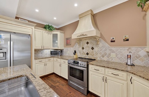 Daytona Beach Haus | Sunset on the Riverfront | Dock | Bring the Boat | Waterfall Grotto Pool