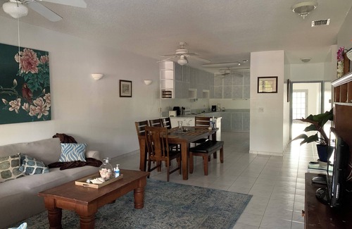 Williams Town Haus | Waterfront home with private dock near the beach