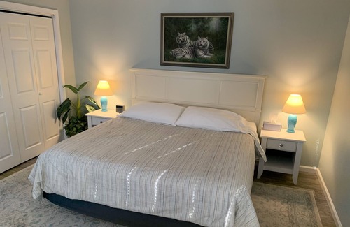 Kent Narrows Haus | Waterfront property on 3/4 acres with private beach, pool, hot tub, and pier.