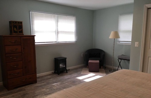 Kent Narrows Haus | Waterfront property on 3/4 acres with private beach, pool, hot tub, and pier.