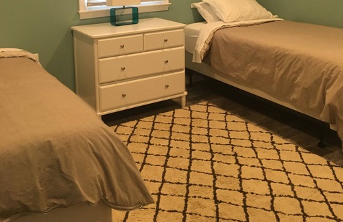 Kent Narrows Haus | Waterfront property on 3/4 acres with private beach, pool, hot tub, and pier.