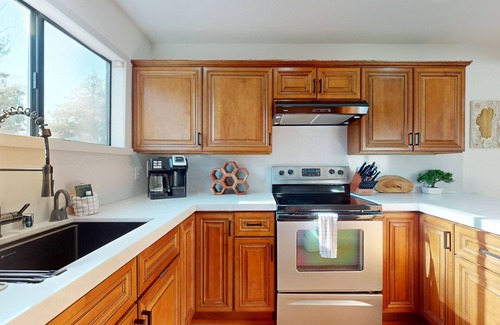 Tahoe Keys Haus | Waterfront townhouse with dock & mountain view - close to skiing, hiking & beach