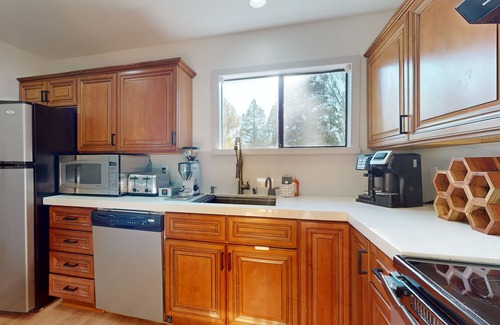 Tahoe Keys Haus | Waterfront townhouse with dock & mountain view - close to skiing, hiking & beach