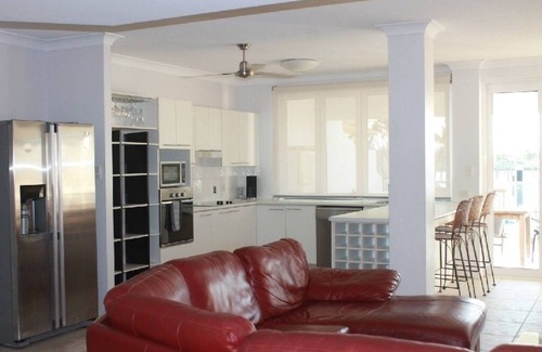 Cardwell Haus | Welcome to 'Hinchinbrook Escape' Waterfront Townhouse with Marina Berth Pool Spa