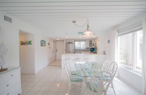 Seven Mile Beach Eigentumswohnung | Ihr Strand Ferienhaus erwartet Sie! Sehen Sie sich unsere Preise für September / Oktober 2019 an!