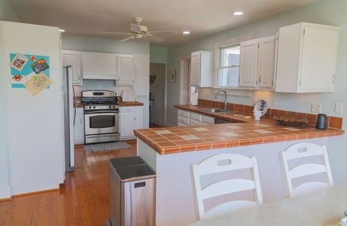 White Stone Haus | Welcome to The Cove - a spacious 6-bedroom house located in charming White Stone