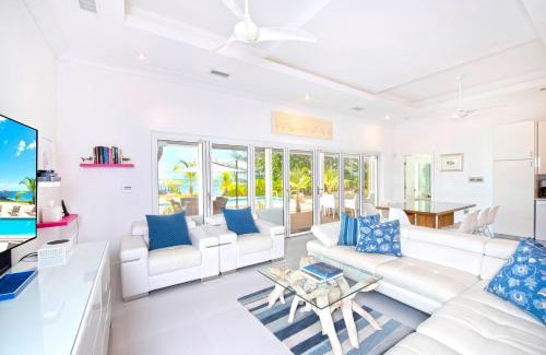 Breakers Haus | White Cottage by Grand Cayman Villas & Condos