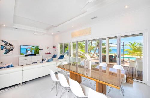 Breakers Haus | White Cottage by Grand Cayman Villas & Condos