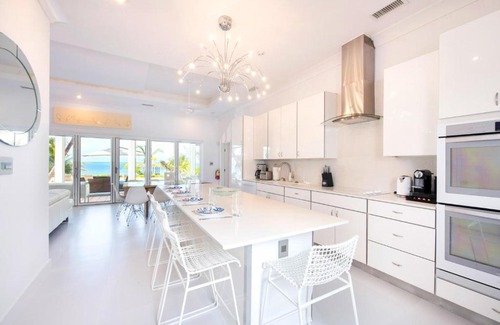 Breakers Haus | White Cottage by Grand Cayman Villas & Condos