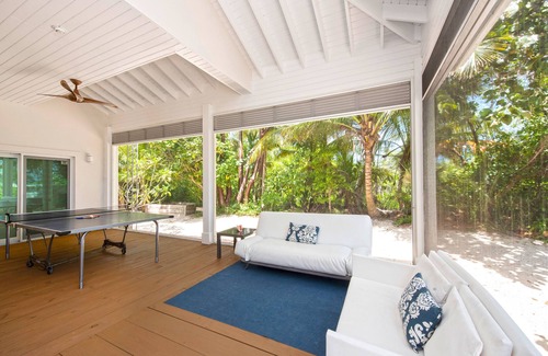 Breakers Villa | White Cottage: Deluxe Oceanfront Home w/Backyard Beachfront, Private Pool, Dock + Free Kayak