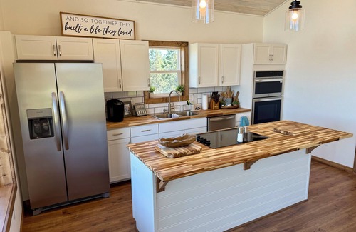 Big Arm Haus | Wild Horse Sunrise at Flathead Lake