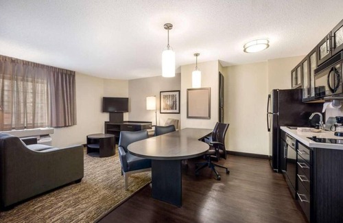 Schiller Park Hotel | Your Home Away From Home! Pet-friendly Property, Full Kitchen, Free Shuttle!