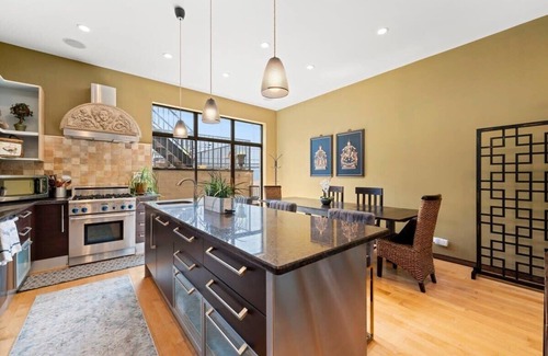 Heart of Chicago Haus | Zen Oasis of Elegance: Expansive Executive Home