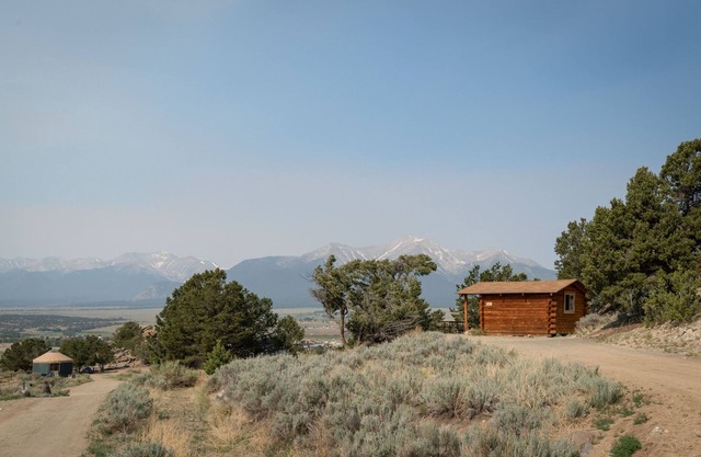 1 Room Dry Camping Cabin. Sleeps up to 4 in one queen bed and a set of twin bunks (bunk bed linens provided upon request).
