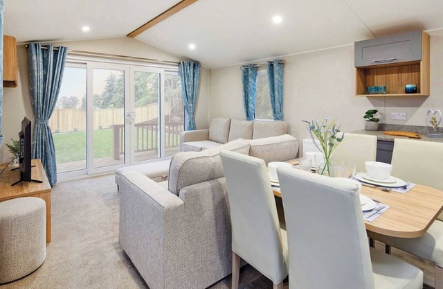 12ft-wide stylish and comfortable caravan with one double and one twin.