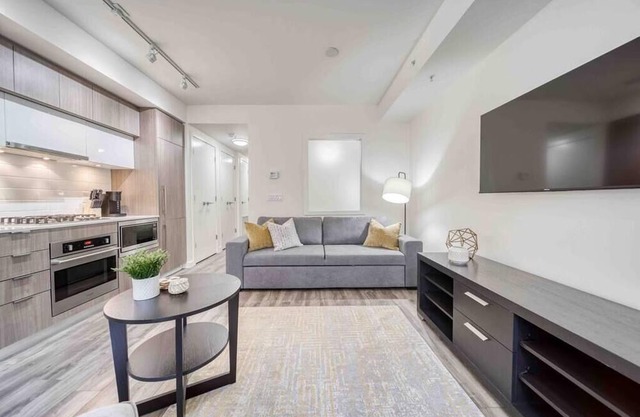 1BR Walkout Condo near Bow River with UG Parking