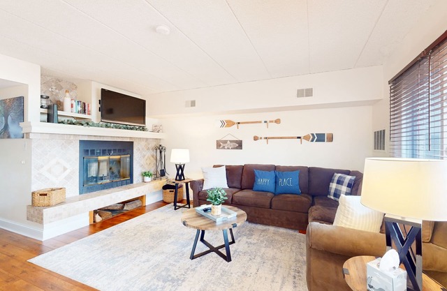 1st-floor lakefront condo with mountain views & pool - near ski/hiking