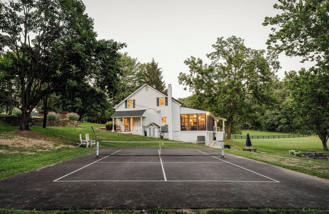 2.5 hours from Washington D.C. this spacious 5BR 2.5BA farmhouse is on a secluded 75-acre property near Manchester, MD, in scenic Carroll County. It promises a relaxing retreat near the state line, exciting local attractions, and natural landmarks.