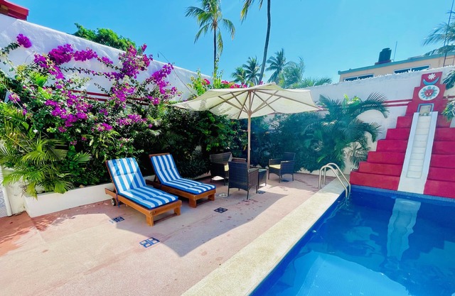 2 bed, 2 bath house w/ private pool, pyramid waterfall, short walk to beach.