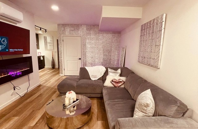 2 bedroom 1.5 bath entire condo + glitter wall + free parking