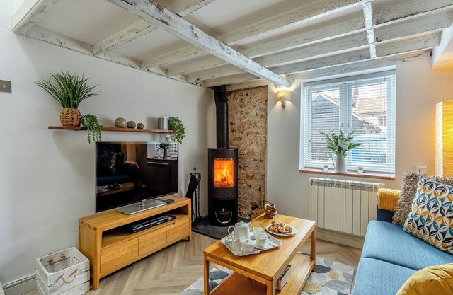 This charming cottage offers the perfect blend of comfort, convenience, and natural beauty.