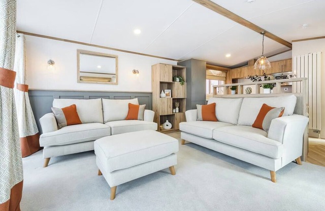 Luxury two bedroom holiday home sleeping four people, perfect for relaxing by the coast.