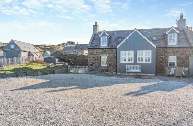 A hidden gem of a cottage, sitting in its own secluded spot on the seafront in Whitehills.
