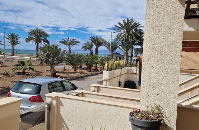 2 bedroom, air conditioned beach apartment with patio, sea and mountain view