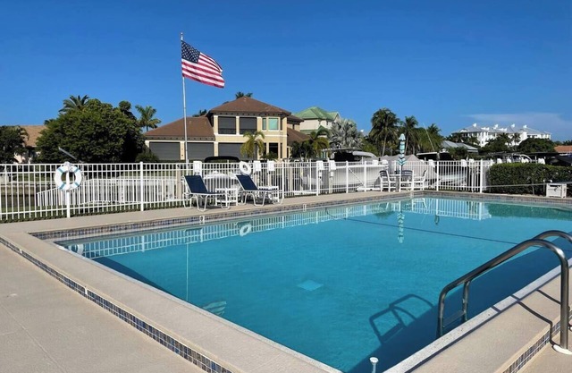 2-bedroom condo in Olde Marco with AC and pool.