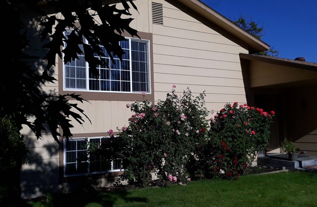 2-bedroom duplex in Boise with WiFi, AC and fenced backyard with patio & gardens