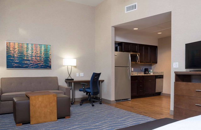 2 Connecting Suites with Two Beds and Two Sofabeds at a Full Service Hotel by Suiteness
