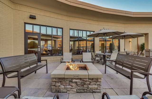 2 Connecting Suites with Three Beds and One Sofabed at a Full Service Hotel by Suiteness