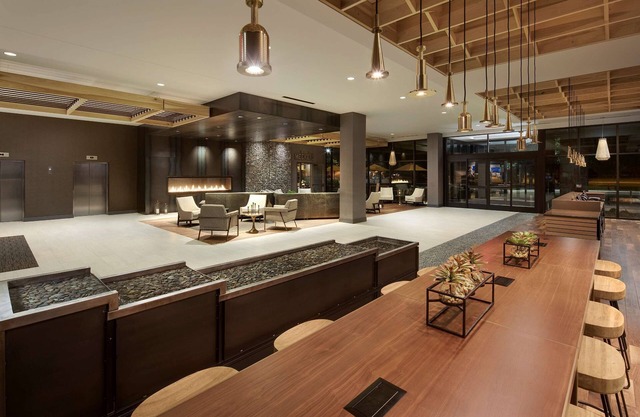 2 Connecting Suites with Three Beds and One Sofabed at a Full Service Hotel by Suiteness