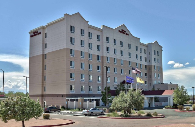 2 Connecting Suites with Two Beds and One Sofabed at a Full Service Hotel by Suiteness
