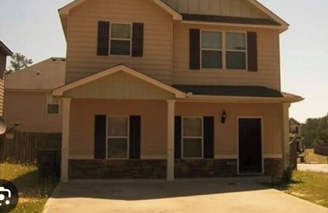 2 story home in Windmark located in Phenix City, 15 mins to Ft Benning/Ft Moore.