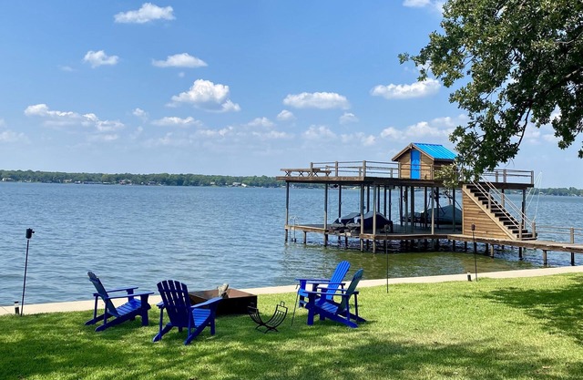 240' of LAKE FRONT with Massive Dock on HUGE Lot!