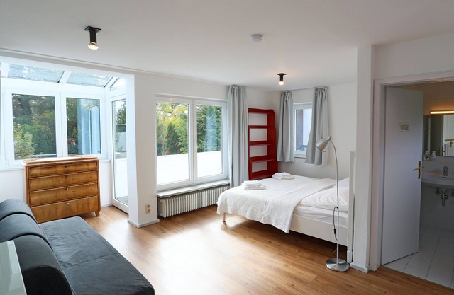 25 min ins Zentrum: Wunderschöne 140 m² Wohnung im Münchner Süden