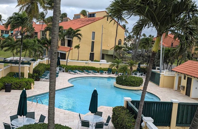 2BR/2BA Villa beach front, golf w/ WiFi, large balcony, steps from the sand!